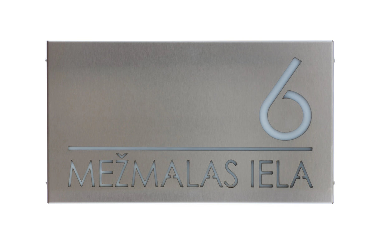 Front view of a stainless-steel horizontal LumiSign Horizon against white, showing number 6, a divider and MEŽMALAS IELA lettering.